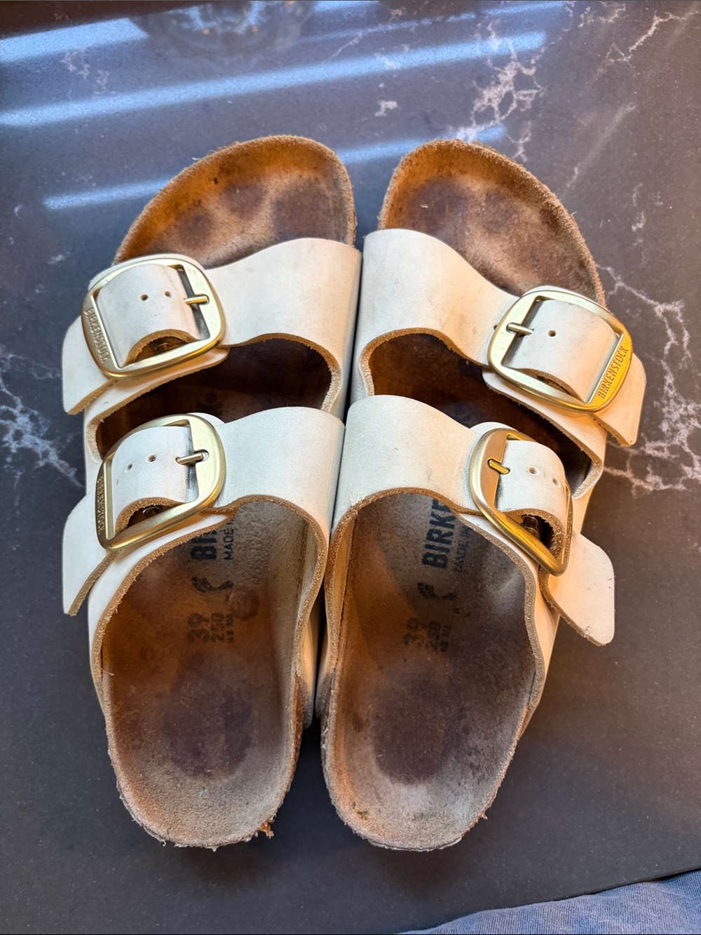 Birkenstock Cream Arizona Sandals with Gold Buckles